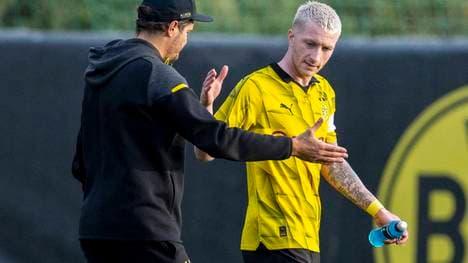 Marco Reus (r., hier mit Trainer Edin Terzic) verlässt das Trainingslager von Borussia Dortmund in Marbella