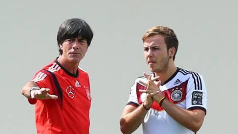 Joachim Löw (l.) führte das DFB-Team 2014 zum WM-Titel