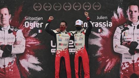 Sebastian Ogier (l.) und sein Co-Pilot feiern ihren WM-Titel
