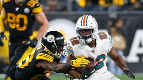 Mark Walton (r.) wurde von der NFL für vier Spiele gesperrt 