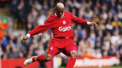 El Hadji Diouf of Liverpool strikes the ball