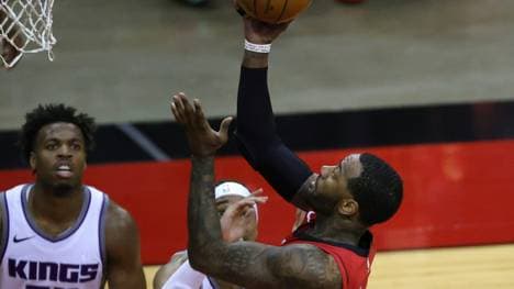 Houstons Matchwinner John Wall (r.)