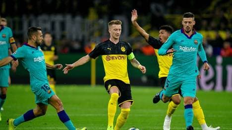 Jordi Alba (l.) zog sich im Spiel gegen den BVB eine Verletzung zu