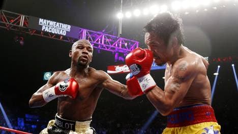 Boxen: Floyd Mayweather Jr. und Manny Pacquiao liefern sich Wortgefecht, Floyd Mayweather Jr. (Links) besiegte 2015 Manny Pacquiao 