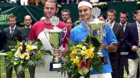 Mardy Fish (l.) war einst ein Herausforderer von Roger Federer r.)