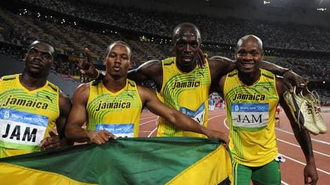 (From L) Jamaica's Nesta Carter, Michael