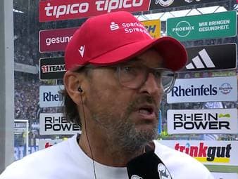 Im Aufstiegskracher hat der MSV Duisburg 2:1 gegen Energie Cottbus gewonnen. Dabei stand der Schiedsrichter Dr. Robert Kampa mit mehreren vermeintlichen Fehlentscheidungen im Fokus. Pele Wollitz teilt nach dem Spiel mächtig aus und spricht von einem roten Faden.
