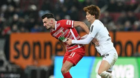 Borussia Mönchengladbach verzweifelt an Berisha (l.)