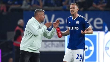 Timo Baumgartl und Thomas Reis (l.) haben grundlegend andere Meinungen zum Schalke-Spiel