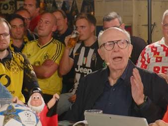 Reiner Calmund wendet sich live im TV an seine Frau. Sie findet, er schreie zu laut ins Mikro im SPORT1-Fantalk - die Antwort ist jetzt schon legendär. 