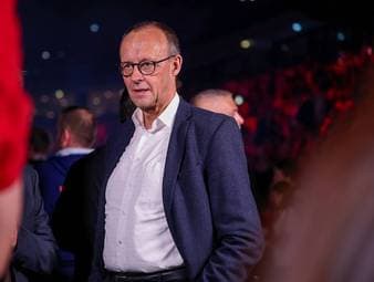 Handball-Legenden witzeln über Merz