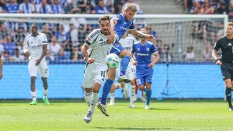 Zwei Torschützen unter sich: Schalkes Kenan Karaman und Magdeburgs Marcus Mathisen