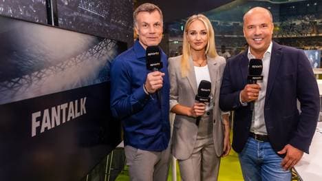 Thomas Helmer, Katharina Kleinfeldt und Hartwig Thöne begleiten die Show live