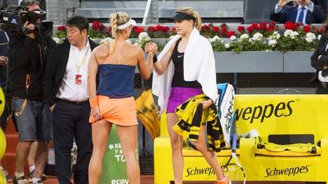 Angelique Kerber (l.) musste beim Duell mit Eugenie Bouchard in Madrid 2017 nach klarem Rückstand aufgeben