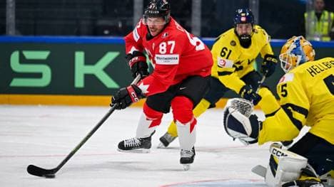 Sidney Crosby (rot) und Kanada siegten zum Auftakt