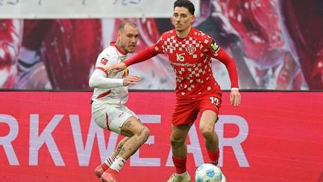 Leipzigs Raum (l.) im Duell mit dem Mainzer Caci (r.)