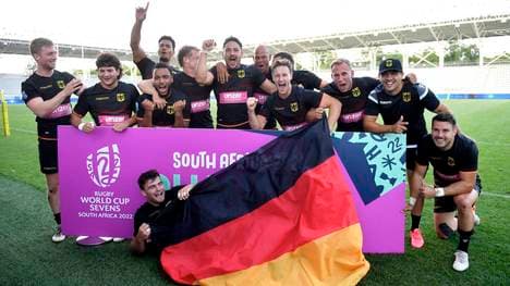 Die deutsche Mannschaft feiert die Teilnahme an der WM