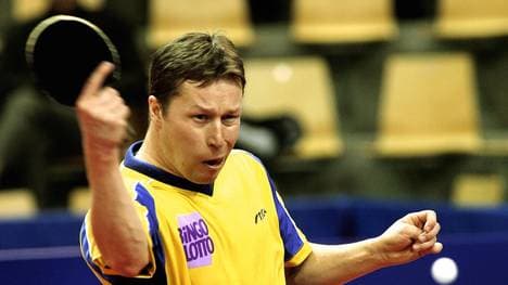 Jan Ove Waldner of Sweden vies against A