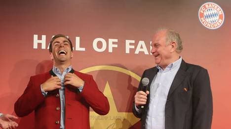 Philipp Lahm Hands Over Championship Trophy To FCB Erlebniswelt