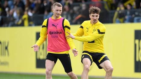 Thomas Meunier (r.) im Zweikampf mit Marco Reus