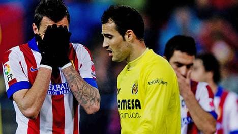 Mario Mandzukic (l.) kassierte mit Atletico Madrid die dritte Saisonniederlage