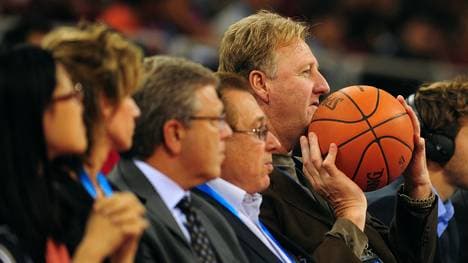 NBA legend Larry Bird (R) looks to retur