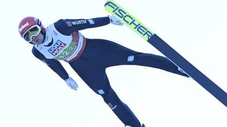 Terence Weber führt nach dem Springen