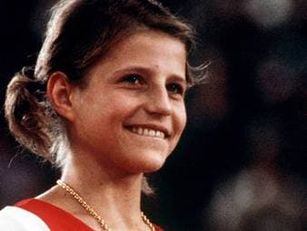 Olga Korbut begeisterte bei Olympia 1972 in München mit spektakulären Übungen und gewann drei Goldmedaillen. Mit ihrem legendären "Korbut-Flip" revolutionierte sie das Turnen und wurde zum Weltstar.