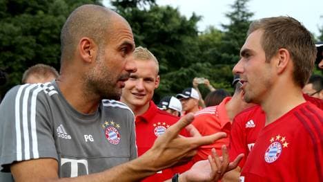 Philipp Lahm (r.) will Pep Guardiola mit dem Triple verabschieden
