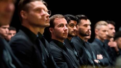 Mario Goetze (C) and other players of German first division Bundesliga football club Borussia Dortmund attend the club's annual general meeting in Dortmund, western Germany, on November 24, 2019. (Photo by INA FASSBENDER / AFP) (Photo by INA FASSBENDER/AFP via Getty Images)