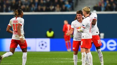 Leipzig's German midfielder Diego Demme celebrates with teammates after scoring a goal during the UEFA Champions League group G football match between FC Zenit and RB Leipzig at the Gazprom Arena in Saint Petersburg on November 5, 2019. (Photo by Olga MALTSEVA / AFP) (Photo by OLGA MALTSEVA/AFP via Getty Images)