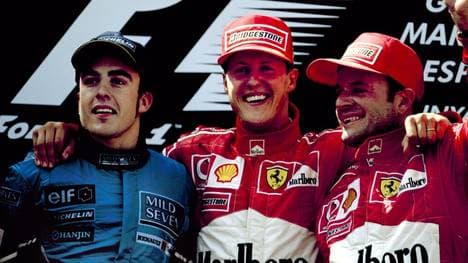 Der junge Fernando Alonso (l.) im Jahr 2003 mit Michael Schumacher und dessen Teamkollege Rubens Barrichello