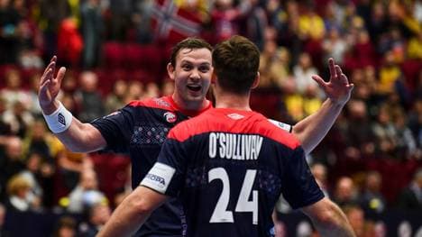 Norway's Sander Sagosen (L) and Norway's Chirstian O'sullivan celebrate their victory after the Men's European Handball Championship, main round match between Norway and Sweden in Malmo, Sweden on January 19, 2020. (Photo by Jonathan NACKSTRAND / AFP) (Photo by JONATHAN NACKSTRAND/AFP via Getty Images)