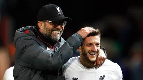 Adam Lallana (r.) beendet seine Karriere