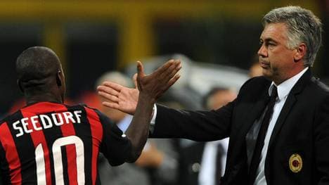 Clarence Seedorf (l.) arbeitete lange mit Carlo Ancelotti zusammen