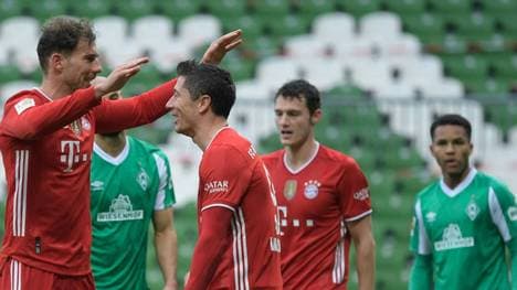 Robert Lewandowski (M.) erzielte seinen 268. Treffer