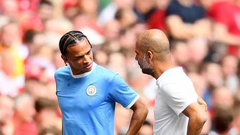 Pep Guardiola (r.) geht von einem City-Verbleib von Leroy Sané aus