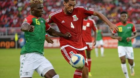 Äquatorialguinea und Rui (r., hier gegen Burkina Faso um Ex-Bundesligaspieler Aristide Bance) beim Afrika-Cup