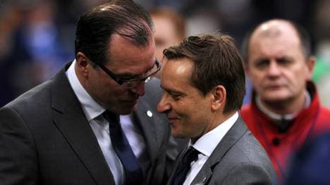 Schalke's manager Horst Heldt (R) and Sc