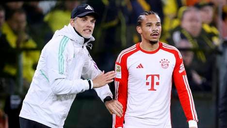 Thomas Tuchel (l.) und Leroy Sané treffen im Viertelfinale auf den FC Arsenal