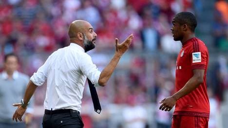 Für Douglas Costa (r.) ist Pep Guardiola "ein Genie"