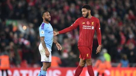 LIVERPOOL, ENGLAND - NOVEMBER 10:  Raheem Sterling of Manchester City speaks with Joe Gomez of Liverpool following the Premier League match between Liverpool FC and Manchester City at Anfield on November 10, 2019 in Liverpool, United Kingdom. (Photo by Laurence Griffiths/Getty Images)