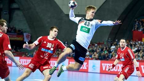 Niclas Pieczkowski (M.) hat bislang 17 Länderspiele für Deutschland bestritten