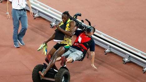 Usain Bolt wird von einem Segway erwischt