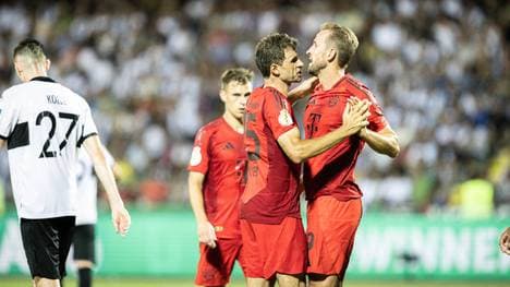 Harry Kane (r.) erzielt ein besonderes Tor