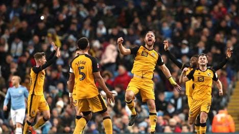 MANCHESTER, ENGLAND - JANUARY 04: Tom Pope of Port Vale celebrates after scoring his team's first goal during the FA Cup Third Round match between Manchester City and Port Vale at Etihad Stadium on January 04, 2020 in Manchester, England. (Photo by Alex Livesey/Getty Images)