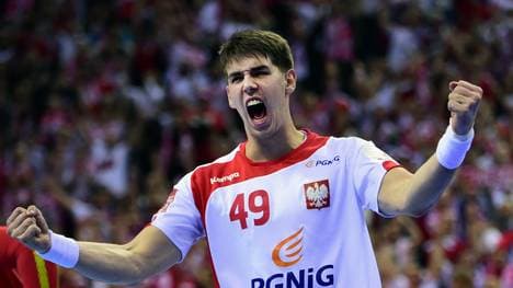 Piotr Chrapkowski jubelt im Trikot der polnischen Nationalmannschaft