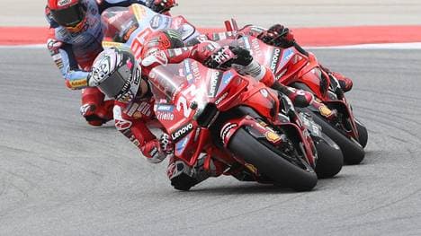 23 Enea Bastianini, ITA, Lenovo Ducati battles with 1 Francesco Bagnaia, ITA, Lenovo Ducati and 93 Marc Marquez, SPA, Greseini Racing Ducati during the Grande PrÃ mio Tissot de Portugal MotoGP round2 at the the Autodromo Internacional Do Algarve, Portimao, Portugal Portimao Portugal Copyright: xGrahamxHoltx FocusXSPortimaoMGP047