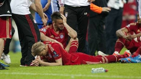 Diego Contento und Anatoliy Tymoschtschuk nach dem verlorenen "Finale dahoam"