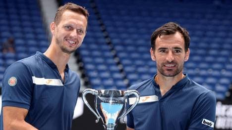Ivan Dodig (r.) und Filip Polasek holen Doppel-Titel
